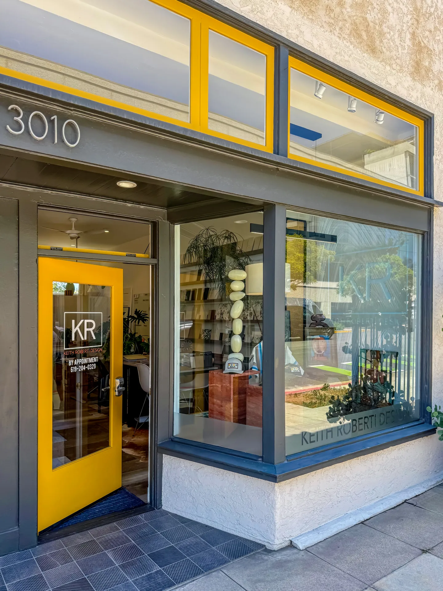 The Keith Roberti Design storefront at 3010 5th Avenue in Bankers Hill, San Diego, with its signature yellow door