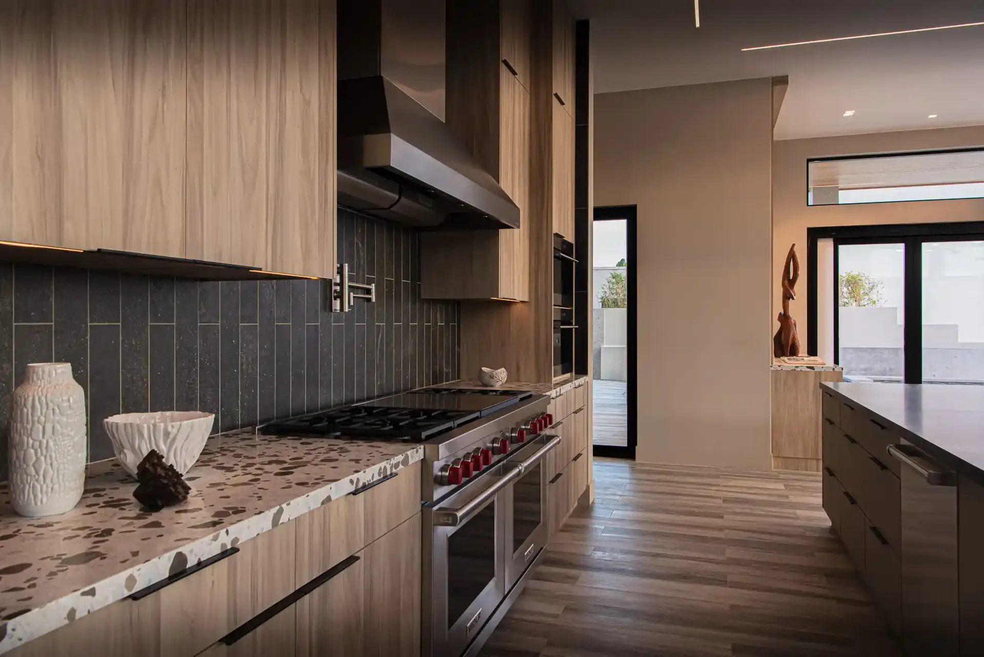 Sagebrush Residence — custom luxury kitchen with teak cabinetry and stone countertops, La Jolla San Diego by Keith Roberti Design